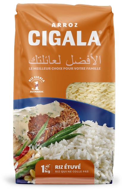 A 1 kg bag of Arroz Cigala rice, featuring a bright orange packaging design with white branding, a bowl of prepared rice and meat on the front, and a small photo of uncooked rice in the upper right.