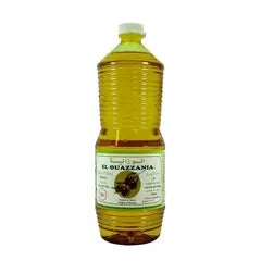 A plastic bottle of olive oil with a white cap and a white label featuring the brand name 'El Quazzania'.