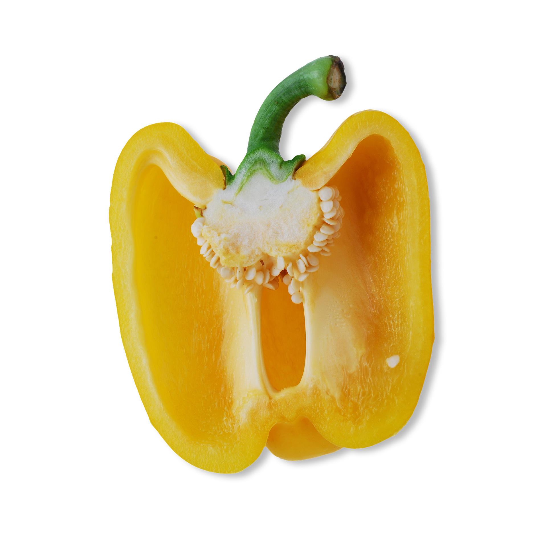 A halved yellow bell pepper with a green stem, showing the white core and seeds, isolated on a white background.